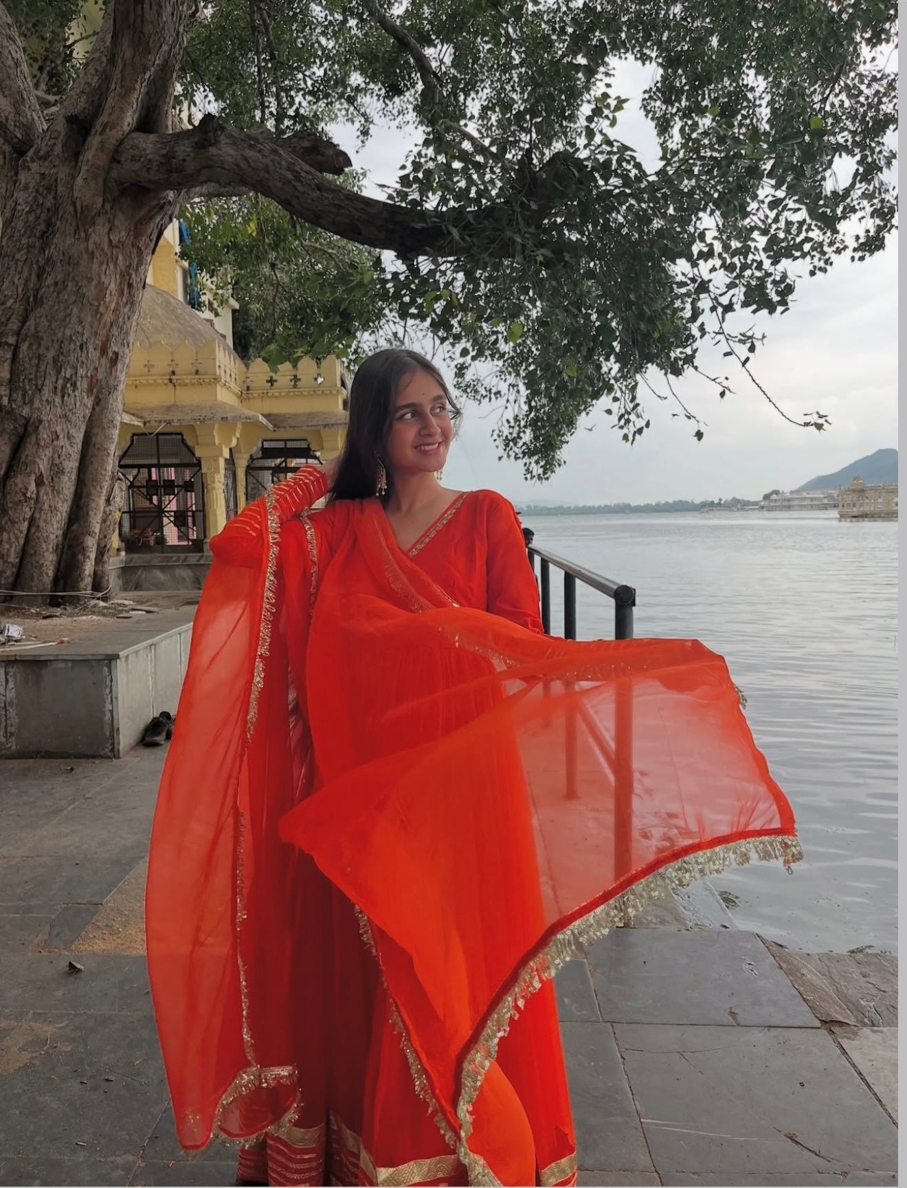 Orange Handwork Angrakha Chiffon Anarkali.